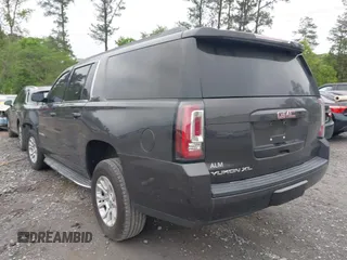 2015 GMC Yukon XL SLE z VIN 1GKS1GKC8FR507436, wystawiony jako IAAI lot #42113696 z przebiegiem Nie podano mil oraz . Historia ofert i sprzedaży dostępna na DreamBid. Obrazek 3.