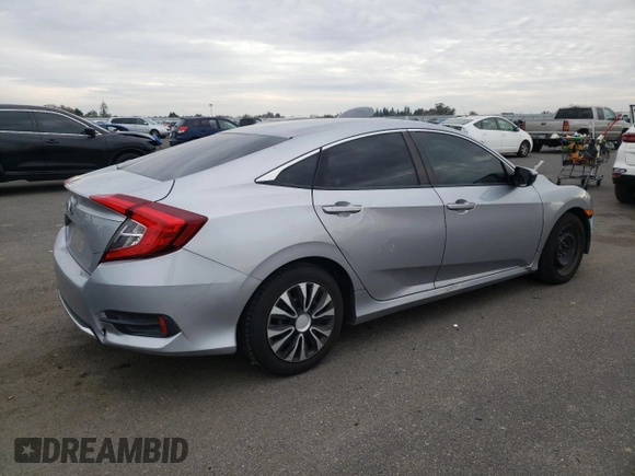 2019 Honda Civic Sedan LX with VIN 19XFC2F61KE200100, listed as a Copart auction lot 37959484 with 131,847 mi miles and Salvage Title. Bid and sale history available at carsss.com. Image 3.