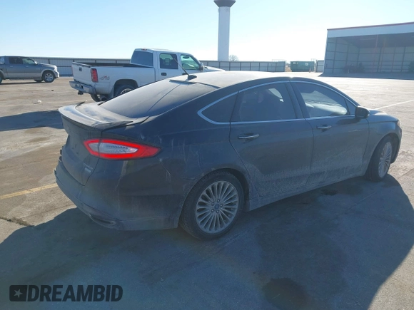 2014 Ford Fusion Titanium with VIN 3FA6P0K93ER293357, listed as a IAAI auction lot 41354955 with 176,130 mi miles. Bid and sale history available at carsss.com. Image 4.