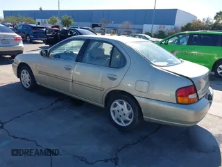 1999 Nissan Altima XE with VIN 1N4DL01D7XC108172, listed as a IAAI auction lot 41513029 with 192,958 mi miles. Bid and sale history available at carsss.com. Image 3.