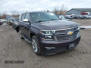 2016 Chevrolet Tahoe LTZ z VIN 1GNSKCKC6GR309481, wystawiony jako IAAI lot #41923164 z przebiegiem 101 777 mil mil oraz . Historia ofert i sprzedaży dostępna na DreamBid. Obrazek 1.