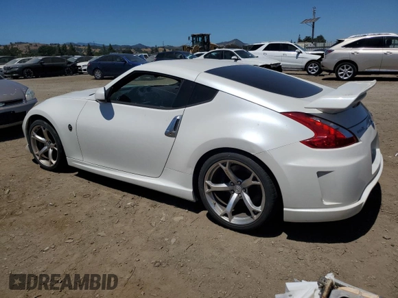 2011 Nissan 370Z Touring z VIN JN1AZ4EH7BM551606, wystawiony jako Copart lot #57173945 z przebiegiem Nie podano mil oraz Szkoda całkowita • Salvage title. Historia ofert i sprzedaży dostępna na DreamBid. Obrazek 2.