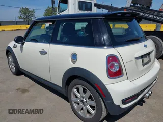2011 MINI Hardtop S with VIN WMWSV3C50BTY23450, listed as a IAAI auction lot 42121502 with 239,025 mi miles and . Bid and sale history available at DreamBid. Image 3.