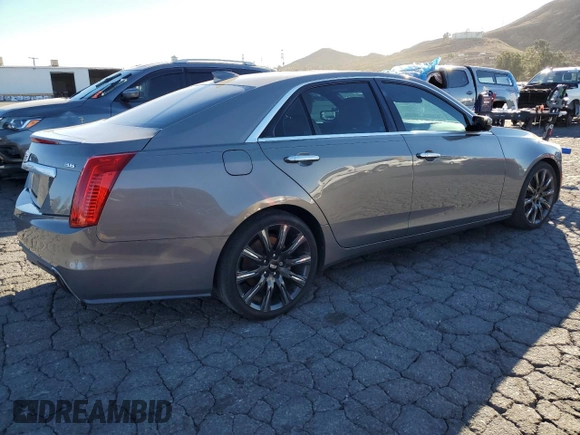 2017 Cadillac CTS Luxury RWD with VIN 1G6AR5SS8H0163564, listed as a Copart auction lot 41536995 with 90,666 mi miles and Salvage Title. Bid and sale history available at DreamBid. Image 3.
