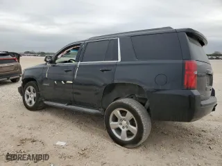 2019 Chevrolet Tahoe LS with VIN 1GNSCAKC6KR264360, listed as a Copart auction lot 87317684 with 72,476 mi miles and Salvage Title. Bid and sale history available at carsss.com. Image 2.