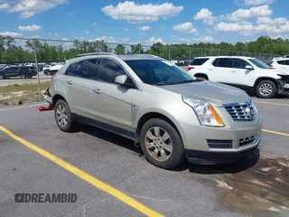 2014 Cadillac SRX Luxury Collection z VIN 3GYFNBE39ES640339, wystawiony jako IAAI lot #42168362 z przebiegiem 153 565 mil mil oraz . Historia ofert i sprzedaży dostępna na DreamBid. Obrazek 1.
