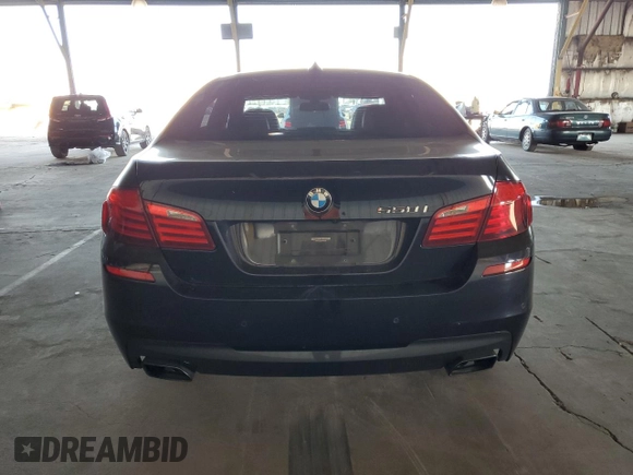 2013 BMW 5 Series 550i with VIN WBAFR9C5XDD226635, listed as a Copart auction lot 74282014 with 71,010 mi miles and Clean Title. Bid and sale history available at DreamBid. Image 6.