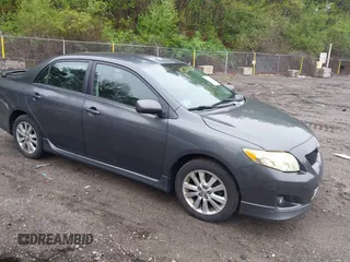 2009 Toyota Corolla with VIN 2T1BU40E29C156642, listed as a IAAI auction lot 42214601 with 255,813 mi miles. Bid and sale history available at carsss.com. Image 1.
