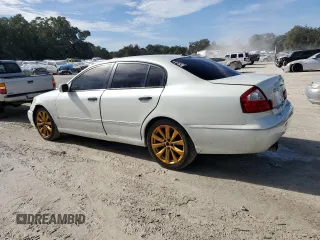 2005 Infiniti Q45 z VIN JNKBF01A85M100070, wystawiony jako Copart lot #82127494 z przebiegiem 176 578 mil mil oraz Szkoda całkowita • Salvage title. Historia ofert i sprzedaży dostępna na DreamBid. Obrazek 2.