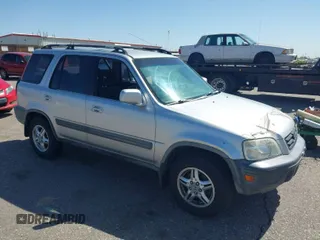 1999 Honda CR-V EX with VIN JHLRD1860XC056641, listed as a IAAI auction lot 42018329 with 321,707 mi miles. Bid and sale history available at carsss.com. Image 1.