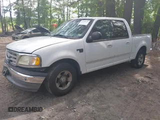 2003 Ford F-150 XLT with VIN 1FTRW07663KD69809, listed as a IAAI auction lot 42198549 with 166,466 mi miles and . Bid and sale history available at DreamBid. Image 17.