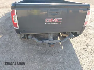 2021 GMC Canyon 2WD Elevation with VIN 1GTG5CEN6M1258058, listed as a IAAI auction lot 41146462 with 147,277 mi miles. Bid and sale history available at carsss.com. Image 6.