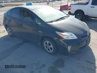 2015 Toyota Prius Four with VIN JTDKN3DU9F0403735, listed as a IAAI auction lot 41477562 with 113,934 mi miles. Bid and sale history available at carsss.com. Image 1.