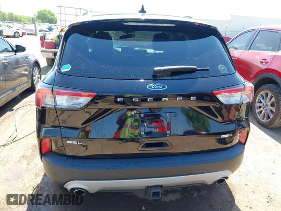 2020 Ford Escape SEL z VIN 1FMCU9H91LUB86584, wystawiony jako IAAI lot #42268456 z przebiegiem 94 753 mil mil oraz . Historia ofert i sprzedaży dostępna na DreamBid. Obrazek 17.