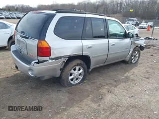 2006 GMC Envoy SLT with VIN 1GKDS13S962109198, listed as a IAAI auction lot 41874502 with 20,785 mi miles. Bid and sale history available at carsss.com. Image 4.