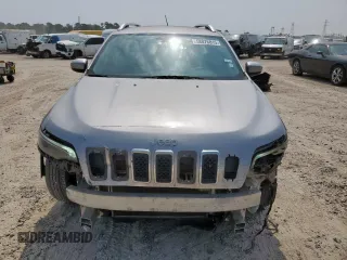 2019 Jeep Cherokee Latitude with VIN 1C4PJLCB2KD332429, listed as a Copart auction lot 58076815 with 124,958 mi miles and Salvage title. Bid and sale history available at DreamBid. Image 5.