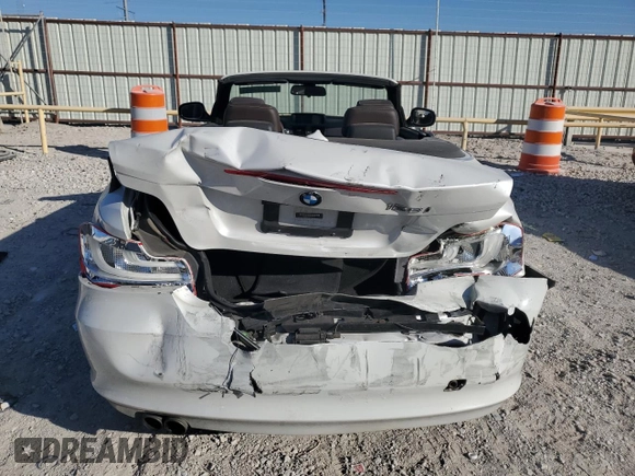 2013 BMW 1 Series 128i with VIN WBAUL7C53DVU09950, listed as a Copart auction lot 77703764 with 94,378 mi miles and Salvage title. Bid and sale history available at DreamBid. Image 6.