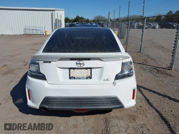 2014 Scion tC z VIN JTKJF5C74E3072410, wystawiony jako IAAI lot #41810965 z przebiegiem 147 164 mil mil oraz . Historia ofert i sprzedaży dostępna na DreamBid. Obrazek 17.