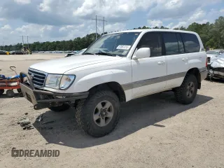 1999 Toyota Land Cruiser z VIN JT3HT05J2X0051123, wystawiony jako Copart lot #57861215 z przebiegiem 396 678 mil mil oraz Szkoda całkowita • Salvage title. Historia ofert i sprzedaży dostępna na DreamBid. Obrazek 1.