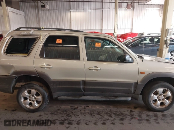 2004 Mazda Tribute ES with VIN 4F2CZ96104KM03252, listed as a IAAI auction lot 41153343 with 204,621 mi miles and . Bid and sale history available at carsss.com. Image 13.