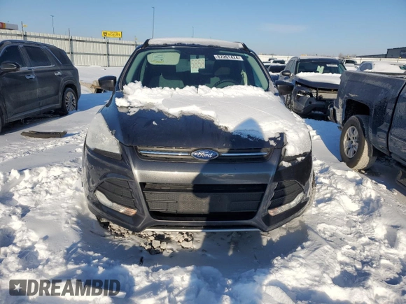 2016 Ford Escape SE z VIN 1FMCU0GX7GUA21205, wystawiony jako Copart lot #87261424 z przebiegiem 112 305 mil mil oraz Szkoda całkowita • Salvage title. Historia ofert i sprzedaży dostępna na DreamBid. Obrazek 5.