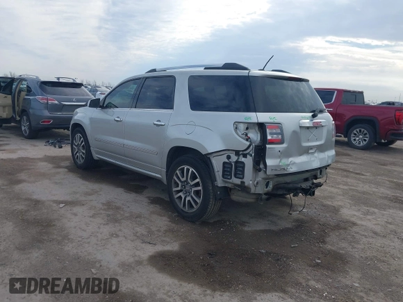 2014 GMC Acadia Denali z VIN 1GKKRTKD1EJ304413, wystawiony jako IAAI lot #41666574 z przebiegiem 115 717 mil mil oraz . Historia ofert i sprzedaży dostępna na DreamBid. Obrazek 3.