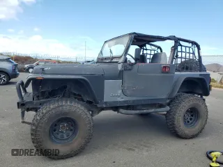 1990 Jeep Wrangler with VIN 2J4FY29T5LJ537896, listed as a Copart auction lot 57021295 with 143,753 mi miles and Clean title. Bid and sale history available at DreamBid. Image 1.