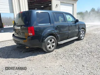2014 Honda Pilot EX-L with VIN 5FNYF3H78EB003547, listed as a IAAI auction lot 41857061 with 192,371 mi miles and . Bid and sale history available at carsss.com. Image 4.