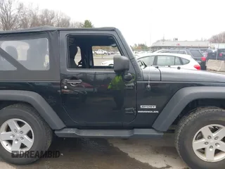 2014 Jeep Wrangler Sport with VIN 1C4AJWAG9EL312856, listed as a IAAI auction lot 42022870 with 98,323 mi miles and . Bid and sale history available at DreamBid. Image 13.