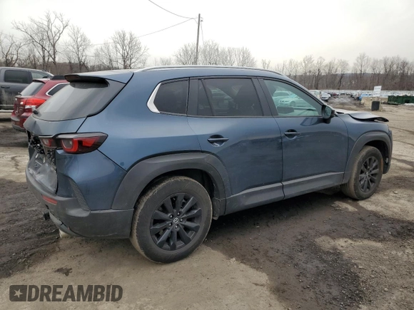 2023 Mazda CX-50 S Select with VIN 7MMVABAM1PN152981, listed as a Copart auction lot 46696195 with 30,857 mi miles and Salvage Title. Bid and sale history available at DreamBid. Image 3.