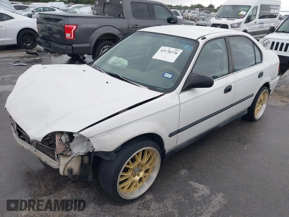 1997 Honda Civic LX z VIN 2HGEJ6676VH534795, wystawiony jako IAAI lot #42170378 z przebiegiem 228 033 mil mil oraz . Historia ofert i sprzedaży dostępna na DreamBid. Obrazek 2.