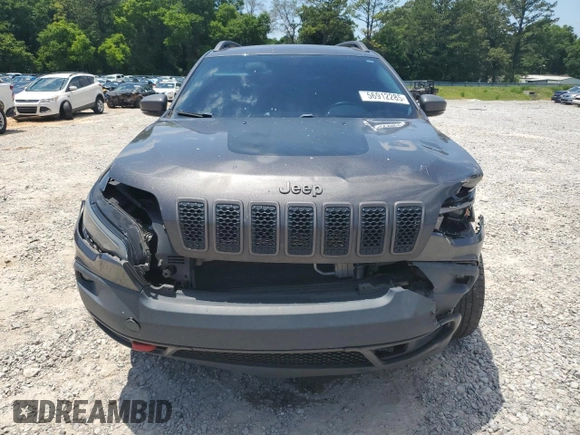 2019 Jeep Cherokee Trailhawk с VIN 1C4PJMBX5KD278692, выставлен на аукционе Copart как лот 56912285 с пробегом 110 964 миль миль и Списание • Salvage title. История ставок и продаж доступна на DreamBid. Изображение 5.