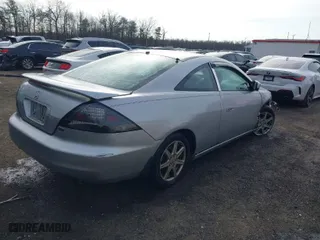 2003 Honda Accord Cpe EX with VIN 1HGCM82653A007091, listed as a IAAI auction lot 40997964 with 213,818 mi miles. Bid and sale history available at carsss.com. Image 4.