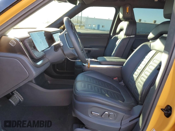 2023 Rivian R1S Launch Edition with VIN 7PDSGABL3PN007354, listed as a Copart auction lot 87954795 with 13,158 mi miles and Salvage Title. Bid and sale history available at carsss.com. Image 7.