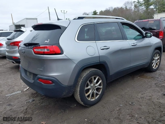 2016 Jeep Cherokee Latitude with VIN 1C4PJMCB4GW203710, listed as a IAAI auction lot 42017248 with 216,117 mi miles. Bid and sale history available at carsss.com. Image 4.