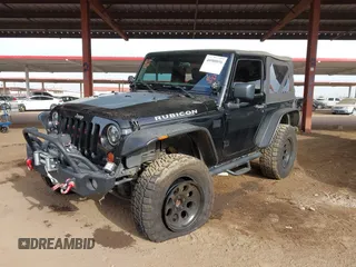 2011 Jeep Wrangler Rubicon with VIN 1J4BA6D13BL545343, listed as a IAAI auction lot 40980056 with 107,207 mi miles and . Bid and sale history available at carsss.com. Image 17.