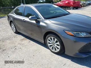 2019 Toyota Camry LE with VIN 4T1B11HK4KU286959, listed as a IAAI auction lot 42063344 with 92,481 mi miles and . Bid and sale history available at DreamBid. Image 1.