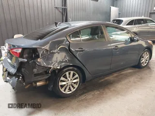 2015 Kia Forte LX with VIN KNAFX4A65F5334212, listed as a IAAI auction lot 42129391 with 150,864 mi miles. Bid and sale history available at carsss.com. Image 6.