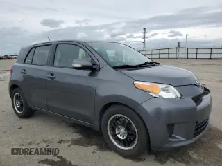 2008 Scion xD with VIN JTKKU10448J031272, listed as a Copart auction lot 51302185 with 121,055 mi miles and Salvage Title. Bid and sale history available at carsss.com. Image 4.