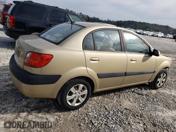 2009 Kia Rio LX with VIN KNADE223296470687, listed as a Copart auction lot 48385925 with 176,400 mi miles and Salvage Title. Bid and sale history available at DreamBid. Image 3.