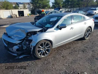 2017 Mazda 6 Grand Touring with VIN JM1GL1W50H1132261, listed as a IAAI auction lot 41930610 with 54,431 mi miles and . Bid and sale history available at DreamBid. Image 17.