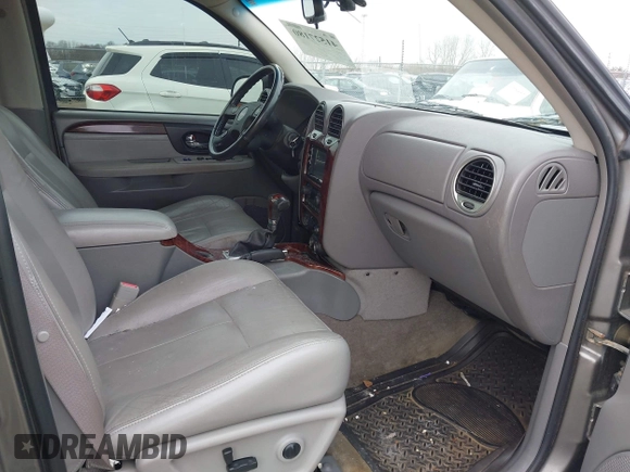 2005 GMC Envoy SLT with VIN 1GKDT13S352129944, listed as a IAAI auction lot 41527180 with 188,541 mi miles. Bid and sale history available at carsss.com. Image 5.