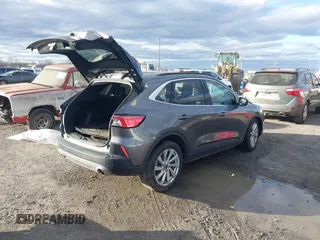 2021 Ford Escape Titanium Hybrid z VIN 1FMCU0DZ0MUB00944, wystawiony jako IAAI lot #41202146 z przebiegiem 52 458 mil mil oraz . Historia ofert i sprzedaży dostępna na DreamBid. Obrazek 4.