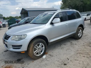 2008 Volkswagen Touareg 2 V6 with VIN WVGBE77L98D003580, listed as a Copart auction lot 52444235 with 150,876 mi miles and Salvage Title. Bid and sale history available at carsss.com. Image 1.