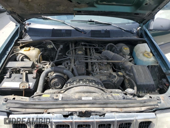 1996 Jeep Grand Cherokee Laredo z VIN 1J4GZ58S8TC222435, wystawiony jako Copart lot #62347665 z przebiegiem 202 125 mil mil oraz Czysty tytuł • Clean title. Historia ofert i sprzedaży dostępna na DreamBid. Obrazek 12.