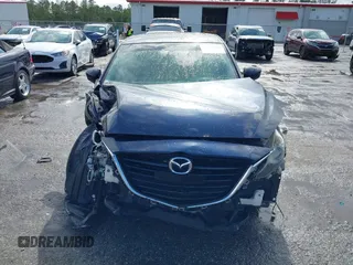 2015 Mazda 3 S Grand Touring z VIN JM1BM1W35F1238188, wystawiony jako IAAI lot #41206030 z przebiegiem 316 542 mil mil oraz . Historia ofert i sprzedaży dostępna na DreamBid. Obrazek 12.
