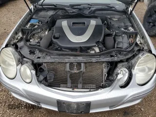 2007 Mercedes-Benz E 550 with VIN WDBUF72X77B059322, listed as a Copart auction lot 72271754 with 149,204 mi miles and Salvage Title. Bid and sale history available at DreamBid. Image 11.
