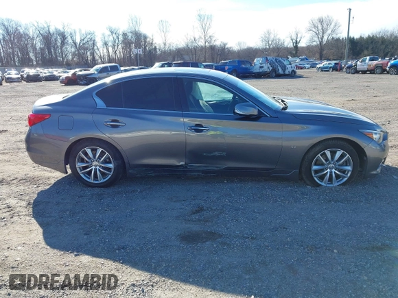 2015 Infiniti Q50 z VIN JN1BV7AR0FM397309, wystawiony jako IAAI lot #41752569 z przebiegiem 116 475 mil mil oraz . Historia ofert i sprzedaży dostępna na DreamBid. Obrazek 13.