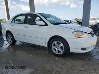 2004 Toyota Corolla CE with VIN JTDBR32E542033286, listed as a Copart auction lot 52639535 with 266,351 mi miles and Clean Title. Bid and sale history available at DreamBid. Image 4.