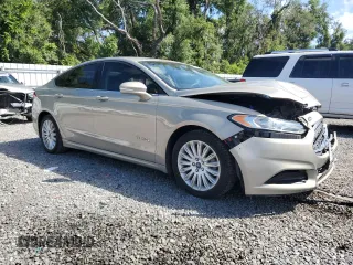 2015 Ford Fusion SE Hybrid z VIN 3FA6P0LU7FR102723, wystawiony jako Copart lot #62334345 z przebiegiem 136 341 mil mil oraz Nie do naprawy • Non repairable. Historia ofert i sprzedaży dostępna na DreamBid. Obrazek 4.